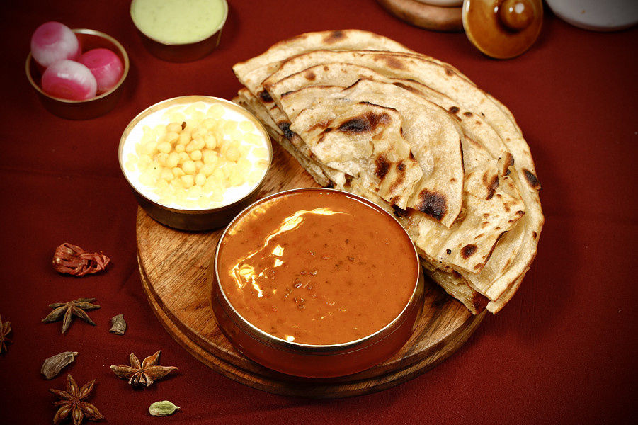Dal Makhani + Boondi Raita + Choice  Of Breads